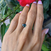 1.40 Ct. Bluish Green Sapphire from Madagascar Life Style