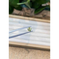 0.71 Ct. Yellowish Green Sapphire from Madagascar Life Style