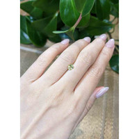 0.71 Ct. Yellowish Green Sapphire from Madagascar Life Style