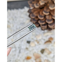 0.65 Ct. Bluish Green Sapphire from Madagascar Life Style