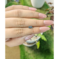 0.65 Ct. Bluish Green Sapphire from Madagascar Life Style