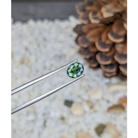 0.88 Ct. Bluish Green Sapphire from Madagascar Life Style