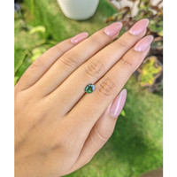 0.88 Ct. Bluish Green Sapphire from Madagascar Life Style