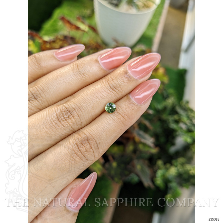 0.71 Ct. Yellowish Green Sapphire from Madagascar