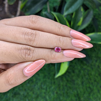 0.66 Ct. Reddish Pink Sapphire from Tanzania Life Style