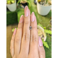 0.87 Ct. Yellowish Brown Sapphire from Madagascar Life Style