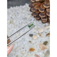 0.89 Ct. Yellowish Green Sapphire from Madagascar Life Style