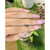 0.89 Ct. Yellowish Green Sapphire from Madagascar Life Style