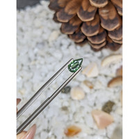 0.71 Ct. Green Sapphire from Madagascar Life Style