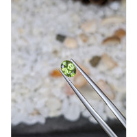 0.66 Ct. Yellowish Green Sapphire from Madagascar Life Style