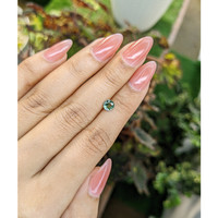 0.60 Ct. Bluish Green Sapphire from Madagascar Life Style