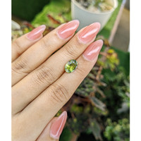 2.98 Ct. Yellowish Green Sapphire from Madagascar Life Style