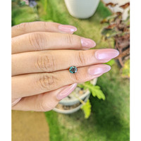 0.97 Ct. Bluish Green Sapphire from Madagascar Life Style