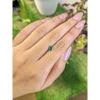 0.79 Ct. Bluish Green Sapphire from Madagascar Life Style
