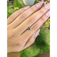 0.86 Ct. Bluish Green Sapphire from Madagascar Life Style