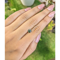 0.75 Ct. Green Sapphire from Madagascar Life Style