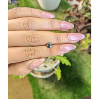 0.75 Ct. Green Sapphire from Madagascar Life Style
