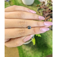 0.75 Ct. Greenish Blue Sapphire from Madagascar Life Style