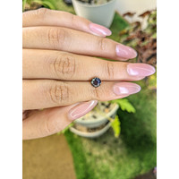 1.21 Ct. Greenish Blue Sapphire from Madagascar Life Style