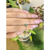 0.60 Ct. Green Sapphire from Madagascar Life Style