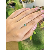 0.60 Ct. Green Sapphire from Madagascar Life Style