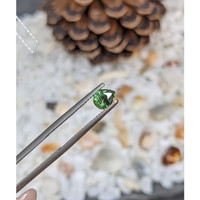 0.82 Ct. Green Sapphire from Madagascar Life Style