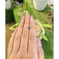 0.69 Ct. Bluish Green Sapphire from Madagascar Life Style