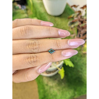 0.69 Ct. Bluish Green Sapphire from Madagascar Life Style