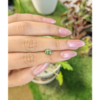0.98 Ct. Yellowish Green Sapphire from Madagascar Life Style