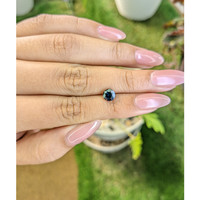 1.26 Ct. Greenish Blue Sapphire from Madagascar Life Style