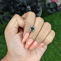 2.52 Ct. Bluish Green Sapphire from Tanzania Life Style