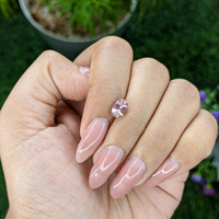 1.09 Ct. Peach Sapphire from Madagascar Life Style