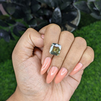 7.50 Ct. Yellowish Green Sapphire from Tanzania Life Style