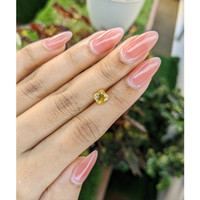 1.54 Ct. Orangish Yellow Sapphire from Ceylon (Sri Lanka) Life Style