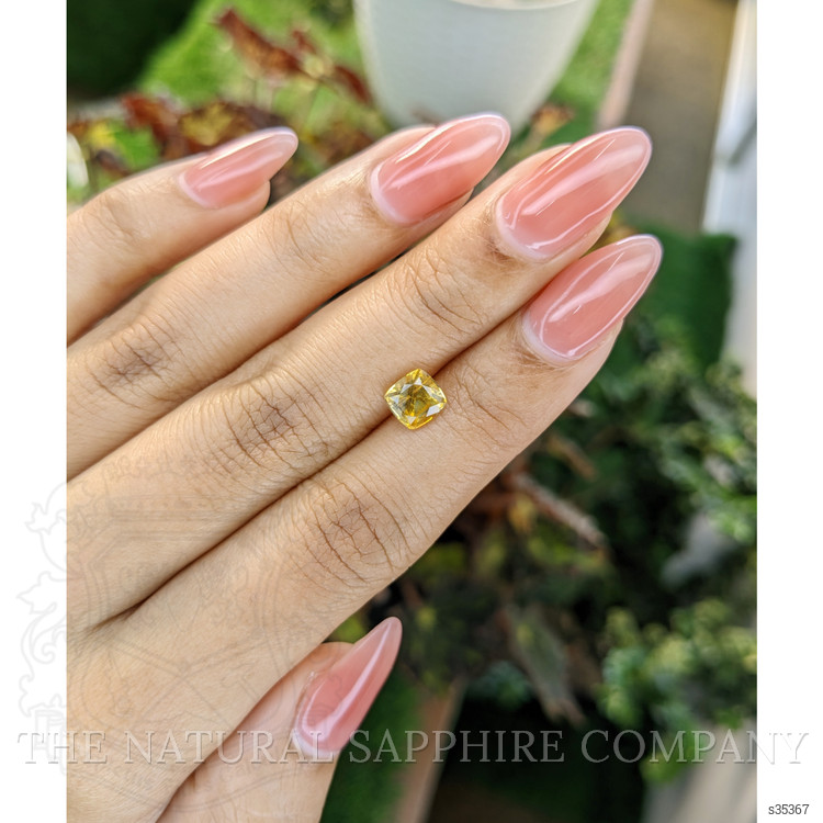 1.54 Ct. Orangish Yellow Sapphire from Ceylon (Sri Lanka)