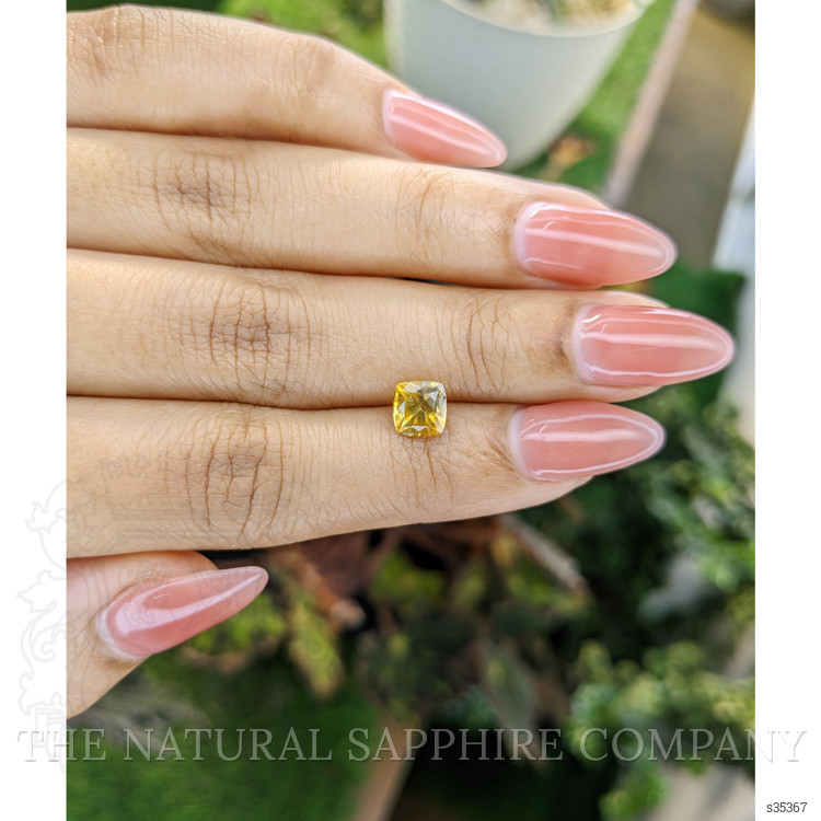1.54 Ct. Orangish Yellow Sapphire from Ceylon (Sri Lanka)