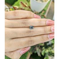 0.98 Ct. Bluish Green Sapphire from Madagascar Life Style
