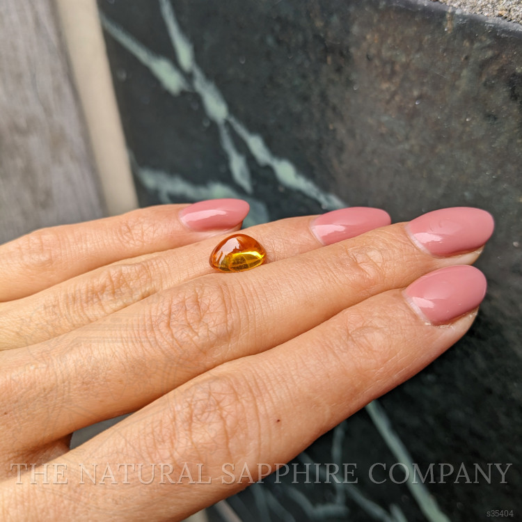 4.17 Ct. Orangish Yellow Cabochon Sapphire from Ceylon (Sri Lanka)