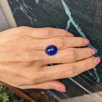 13.38 Ct. Blue Cabochon Sapphire from Madagascar Life Style