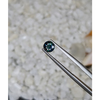 0.75 Ct. Greenish Blue Sapphire from Madagascar Life Style