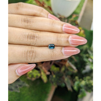 0.68 Ct. Greenish Blue Sapphire from Madagascar Life Style