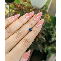 0.81 Ct. Greenish Blue Sapphire from Madagascar Life Style