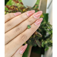 1.19 Ct. Yellowish Green Sapphire from Madagascar Life Style