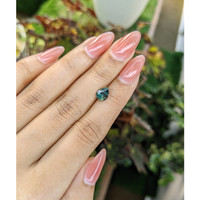 1.38 Ct. Bluish Green Sapphire from Madagascar Life Style