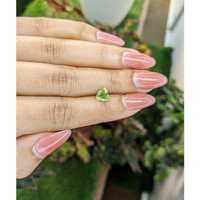 1.21 Ct. Yellowish Green Sapphire from Madagascar Life Style