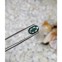 1.58 Ct. Bluish Green Sapphire from Madagascar Life Style
