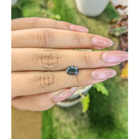 1.58 Ct. Bluish Green Sapphire from Madagascar Life Style