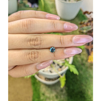 0.79 Ct. Greenish Blue Sapphire from Madagascar Life Style