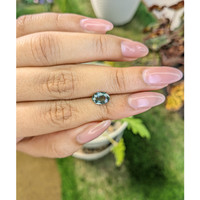 1.41 Ct. Bluish Green Sapphire from Madagascar Life Style