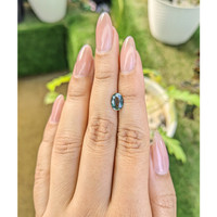 1.41 Ct. Bluish Green Sapphire from Madagascar Life Style
